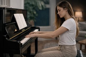 Woman playing Yamaha U1